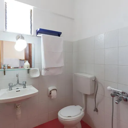 Апартаменты Cozy Archangelos With Private Parking *